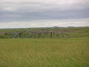 Close up view of transmission tower down near Amherst, Nebraska. Photo by NWS Staff. 