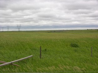 Power poles snapped near Amherst. Photo by NWS staff.