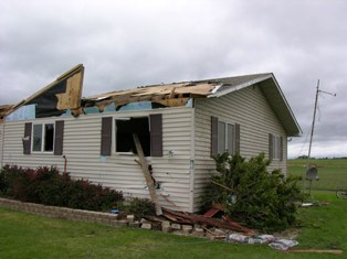 Roof taken off of home near Amherst, Nebraska. Photo taken by NWS Staff.