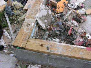 Foundation of house destroyed near Amherst, Nebraska. Photo by NWS Staff.