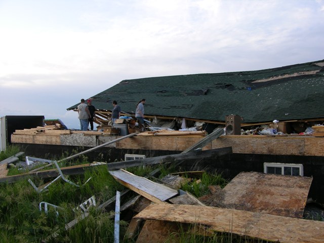 House under construction pushed halfway off its foundation. Photo by NWS Staff.