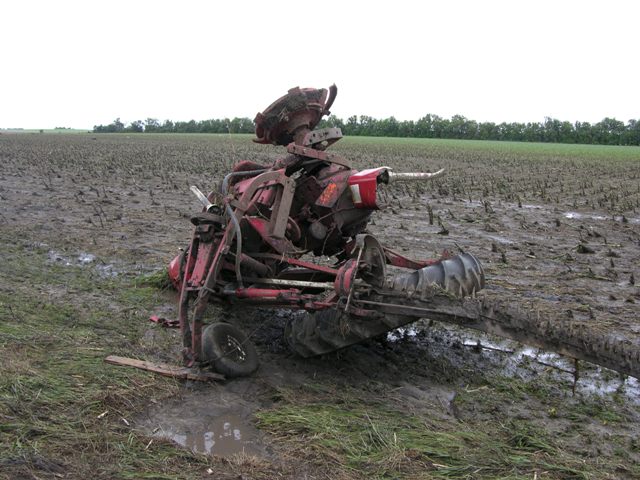 Tractor crumpled and tossed in field on Highway 92 near Osceola, NE. Photo by NWS Staff.