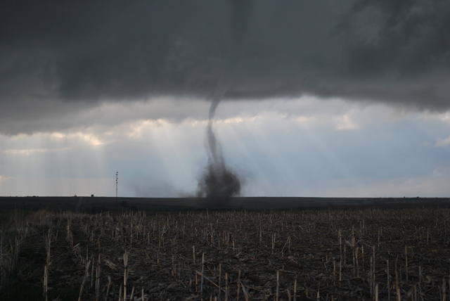 The above photos were taken of the EF0 tornado about 4 miles north northeast of Oxford Nebraska. Photos courtesy of Trevor Tetley. 