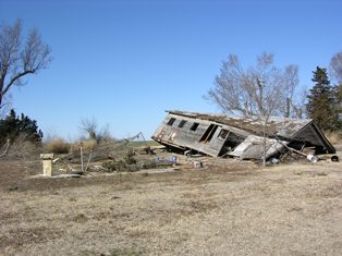Barn displaced from foundation as a reult of an EF0 tornado in Jewell County Kansas on February 28, 2012.