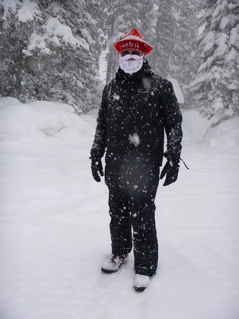 Santa standing in snow on the Grand Mesa