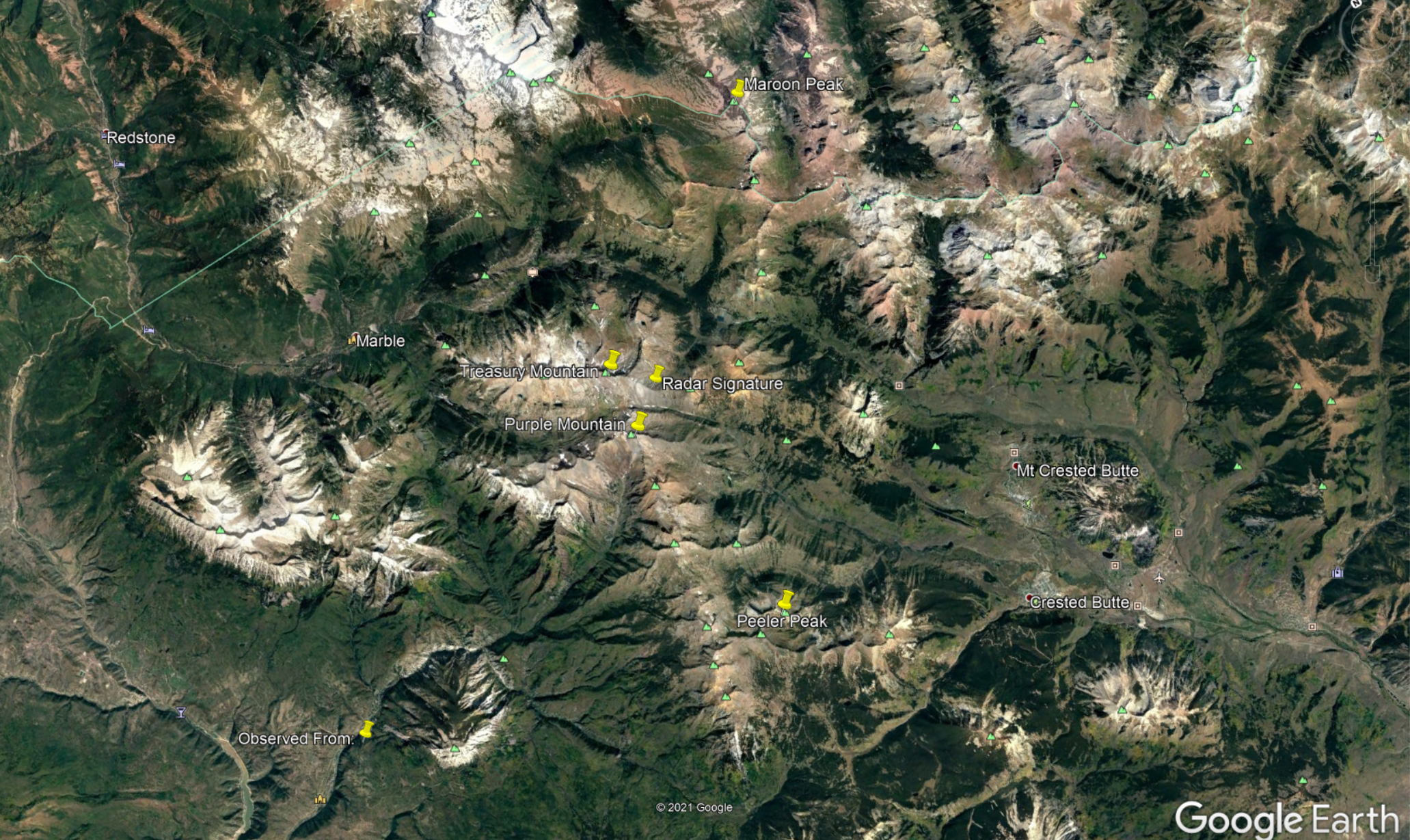 Google Earth image showing estimated landspout touchdown compared to terrain features