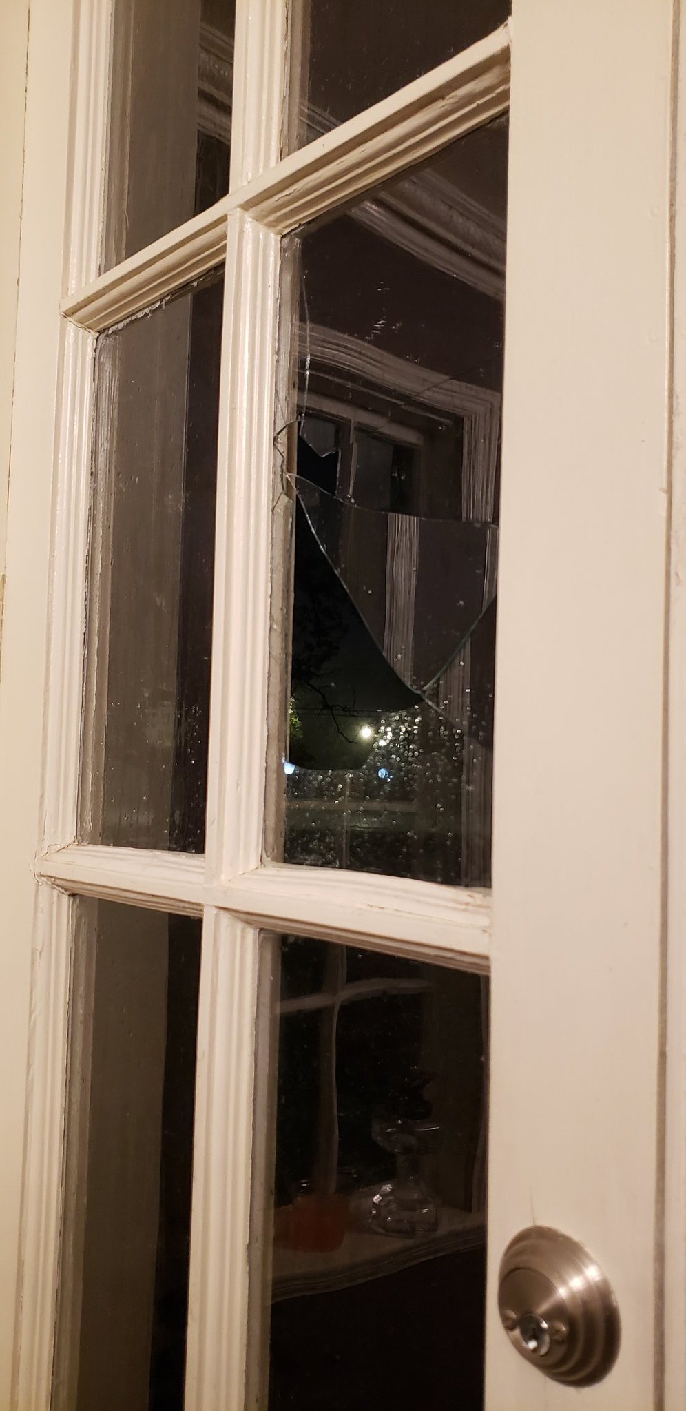 Hail Damage to Window in Bryan