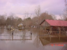 Flooding inundates this Day Care building on River Loop Road.