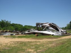 This metal barn was completely destroyed by the tornado. Scrap metal from the structure was blown as far as a half a mile away.