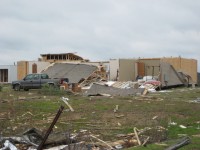 A double-wide manufactured home in the Powell community in western DeKalb County was moved off of its foundation. The roof was completely blown off and some of the exterior walls were knocked down and fell into the structure.