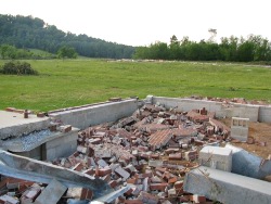 Near Mt Hope...the well-built house and neighboring chicken house both completely destroyed. 