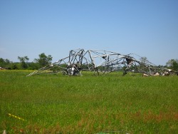 Metral transmission truss towers crumpled near County Rd 112 near High Point. 