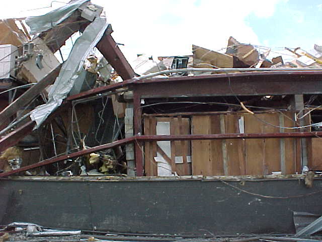The administrative office also contained a concrete storm shelter for employees.  This was one of the few areas still standing after the tornado.