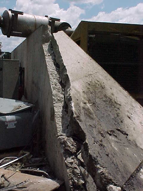 This concrete wall, on the western part of the complex, was broken by the tornado.
