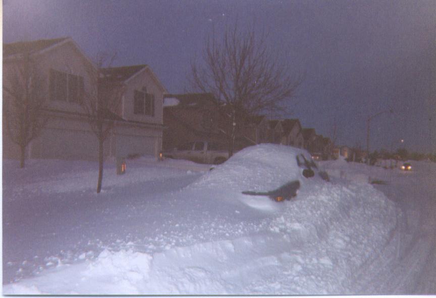 Car plowed on Gill Street in Bloomington after Feb 13 Blizzard, photo by Kirk Huettl
