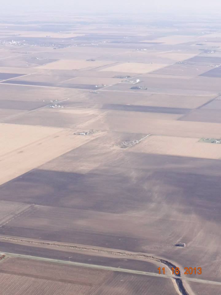 Scour marks left in farm fields by the tornado near Gifford.  Photo courtesy of the Illinois Emergency Management Agency.