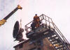 Installation of weather balloon tracking equipment, Feb. 1995