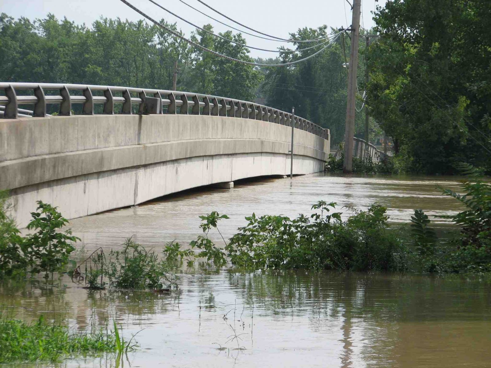 Blanchard River in Ottawa. Wire weight gage on bridge, far left in picture
