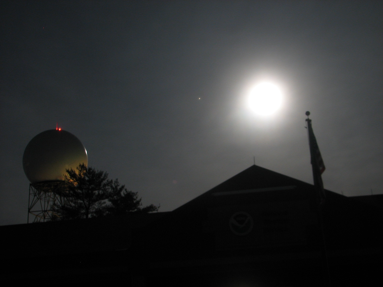 Wolf Moon directly over NWS Northern Indiana office. WSR-88D radar to the left. 