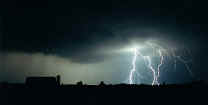 Lightning at Middlebury, Indiana, July 28, 2000.  This storm blew down power lines in Middlebury. Photo courtesy Doug Berry.