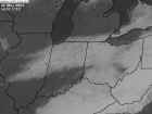 Can you tell where the clouds end and the snow begins? This is a visible satellite image taken after the late March 2002 snowstorm. The snow begins in western Illinois and goes through northern Indiana...northwest Ohio and southern Michigan. Clouds extend from north central Ohio into Kentucky.