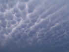 Mammatus clouds taken on July 4, 2001, by meteorologist John Taylor.
