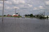 On State Route 81 east of Willshire, Ohio, a delivery truck is stranded in flood waters. Never attempt to cross flooded roads...the water may be deeper than it appears and it could be a fatal mistake.