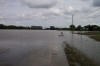 Extremely deep river flood waters onto U.S. Route 33 southeast of Willshire, Ohio.