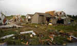 Destruction from the Kendallville tornado of July 14, 1992. The twister produced F2 damage as it damaged 208 homes, 2 apartment buildings, 23 businesses, and wrought $13,000,000 in damage.