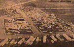 Additional damage from the double tornado at Midway. Some of the intact trailers along the bottom of the photo may be temporary housing that was quickly set up for survivors of the storm whose homes were obliterated.