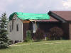 Thunderstorm wind damage at Hicksville, Ohio, 
      on July 29, 2002.