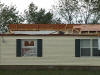 Thunderstorm wind damage at Hicksville, Ohio, 
      on July 29, 2002.