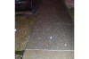 Small hail on a sidewalk outside the Northern 
      Indiana NWS office March 13, 2003.  The storm struck at 
      3:30a.m....this picture was taken about half an hour later.  The 
      temperature at the time of the thunderstorm was 34 degrees.