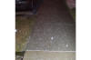 Small hail on a sidewalk outside the Northern 
      Indiana NWS office March 13, 2003.  The storm struck at 
      3:30a.m....this picture was taken about half an hour later.  The 
      temperature at the time of the thunderstorm was 34 degrees.