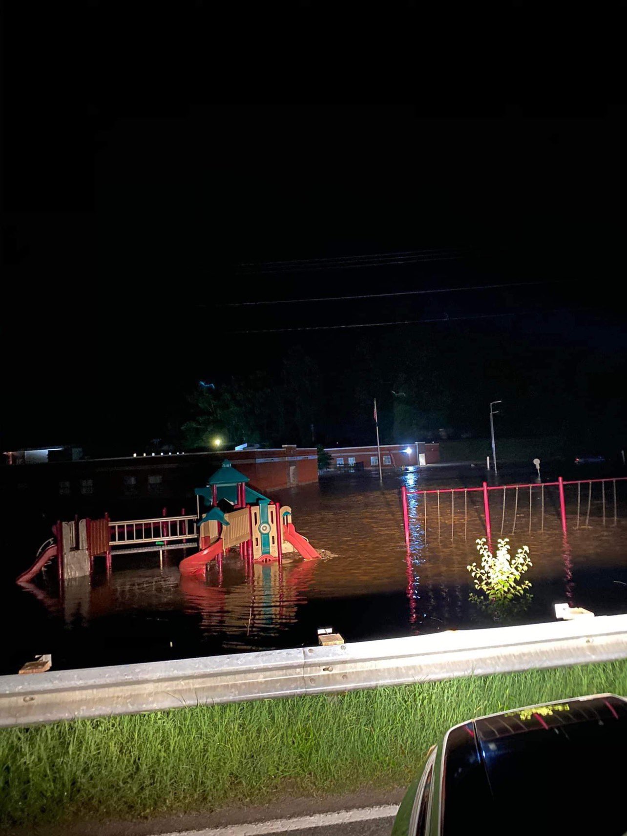 Buckhorn School's playground under water due to flash flooding in Perry County, KY