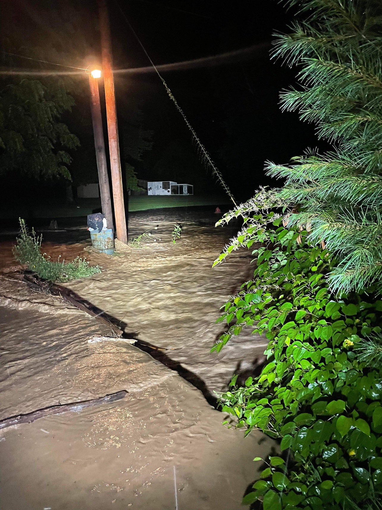 Rushing flood waters on Jett's Creek Rd on the Breathitt/Owsley County Line