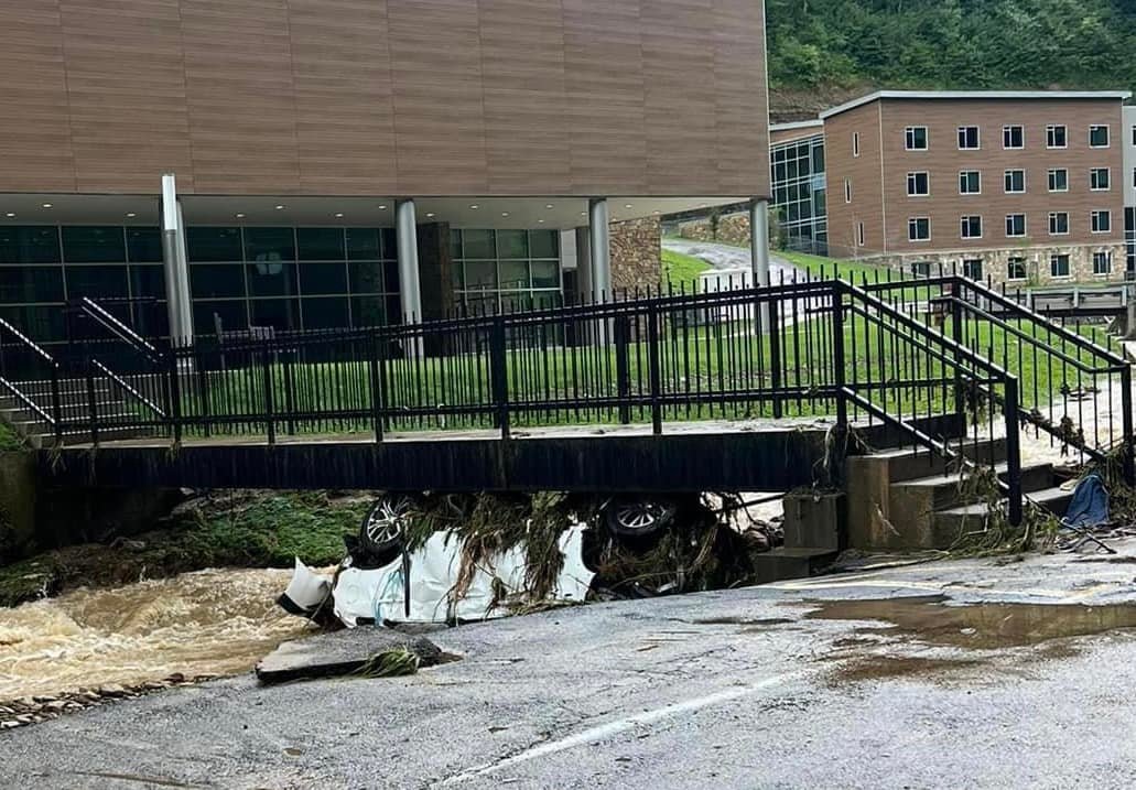 A car was swept off the road at Alice Lloyd College in Pippa Passes, KY