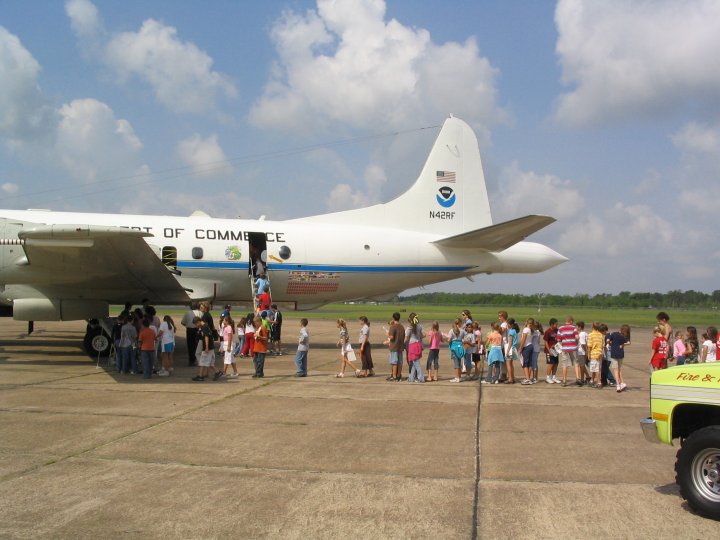 Picture of students lining up to board the plane