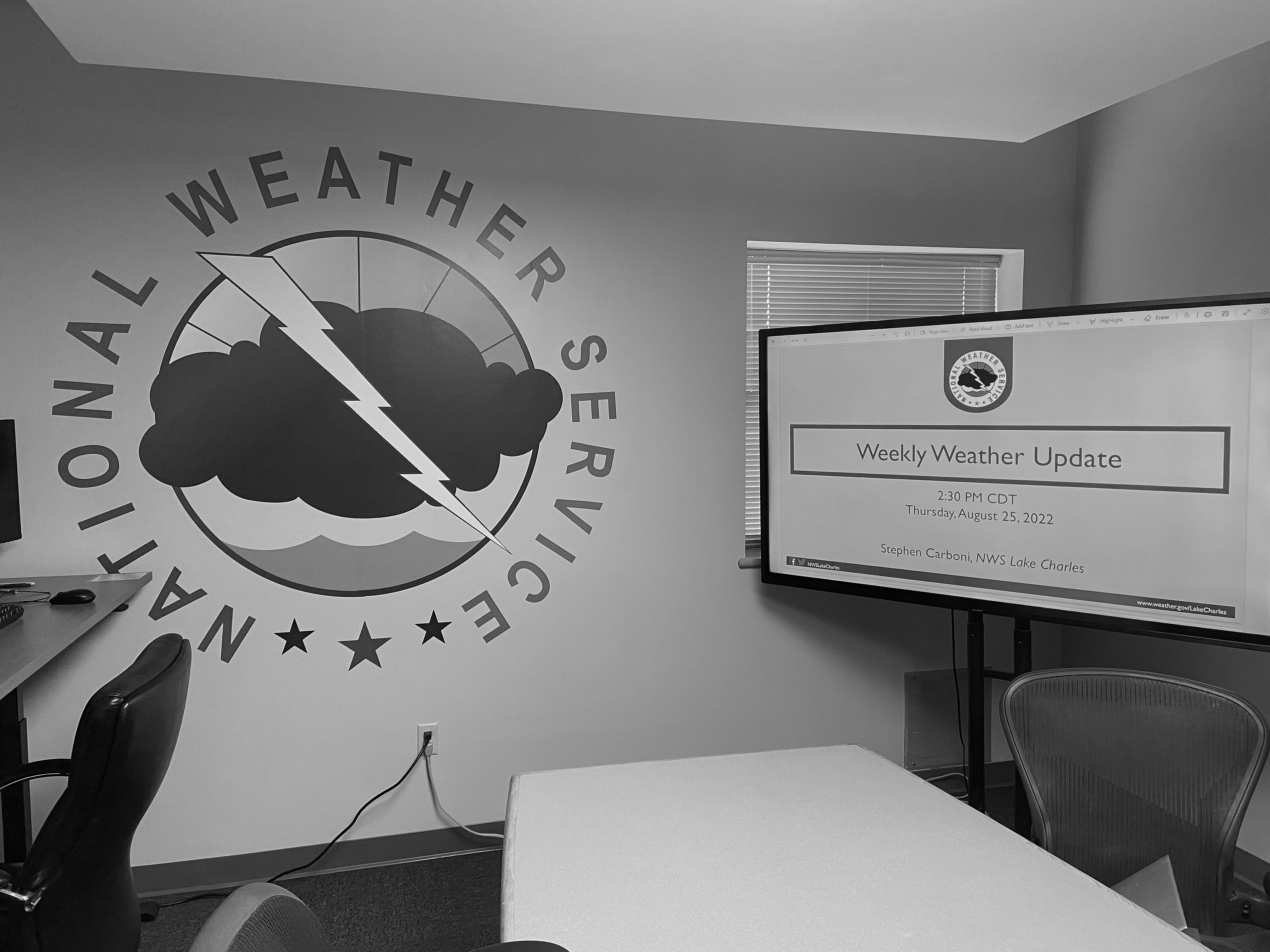 Image of NWS logo + big screen showing briefing
