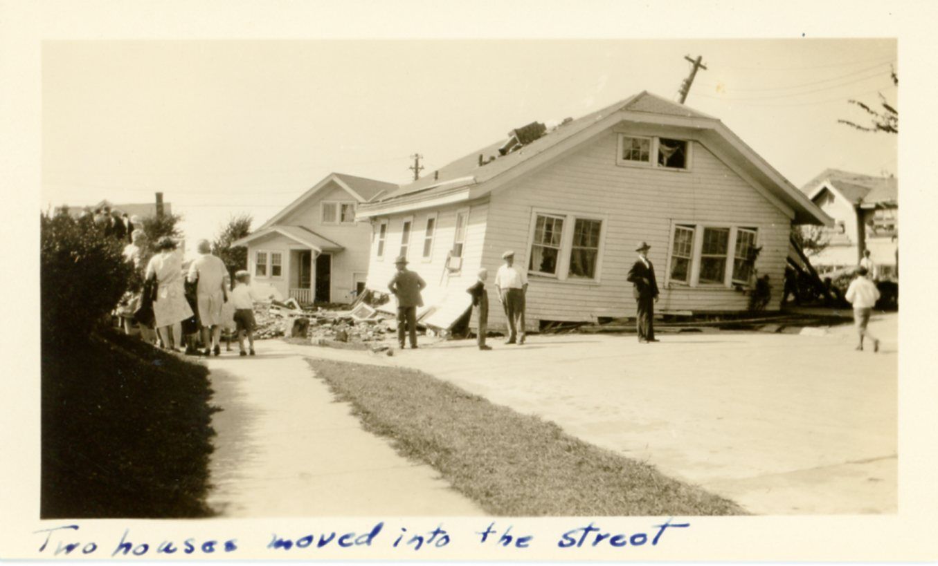 Damage in the Rockview neighborhood of Rockford. Photo shows two houses blown completely off their foundations and into the street.
