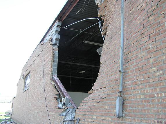 Hole blown into north side of building