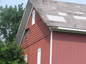 Damage to a barn from tornado in Bolingbrook