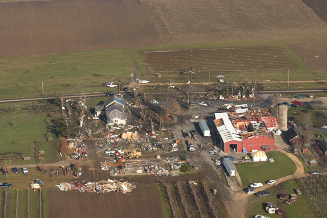 photo showing damage from the Poplar Grove Harvard tornado