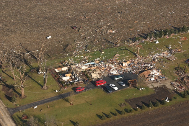 photo showing damage from the Poplar Grove Harvard tornado
