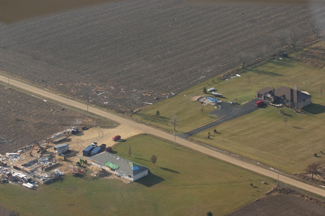 photo showing damage from the Poplar Grove Harvard tornado