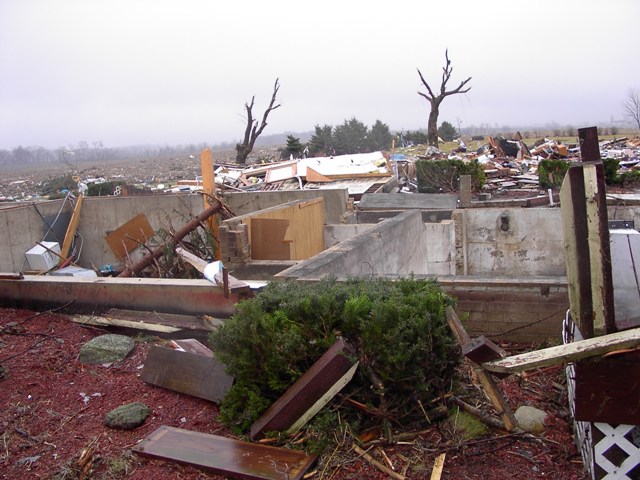 photo showing damage from the Poplar Grove Harvard tornado