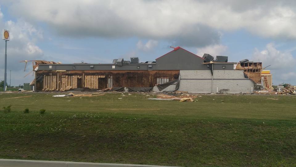 Photo showing damage to a gas station from the Pontiac tornado