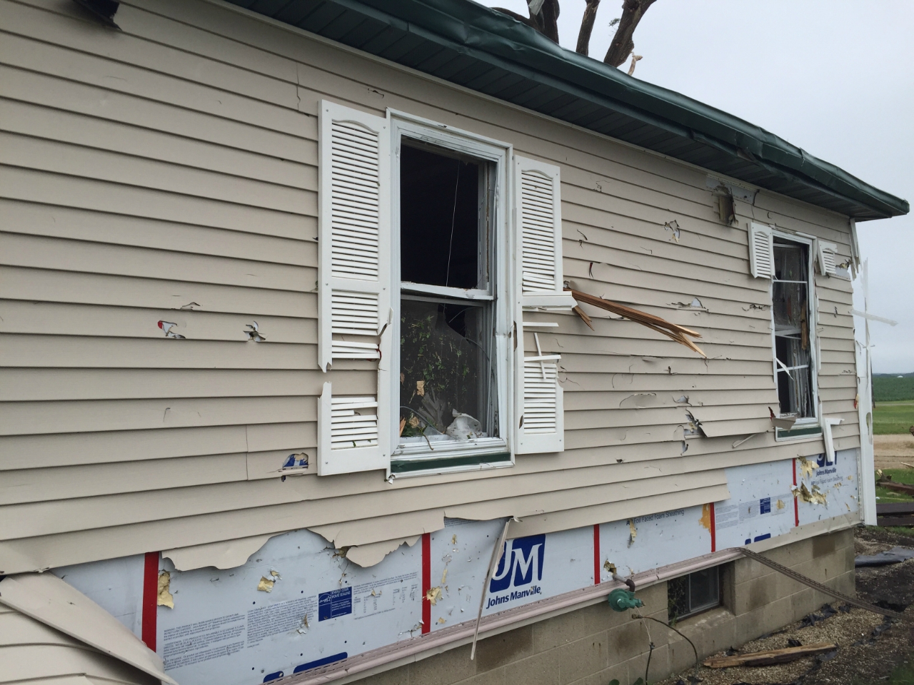 Photo showing damage to house from Marseilles-Seneca tornado