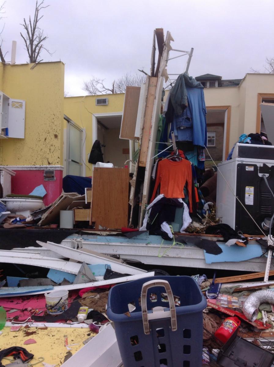 Photo showing damage to residence from the Naplate-Ottawa tornado