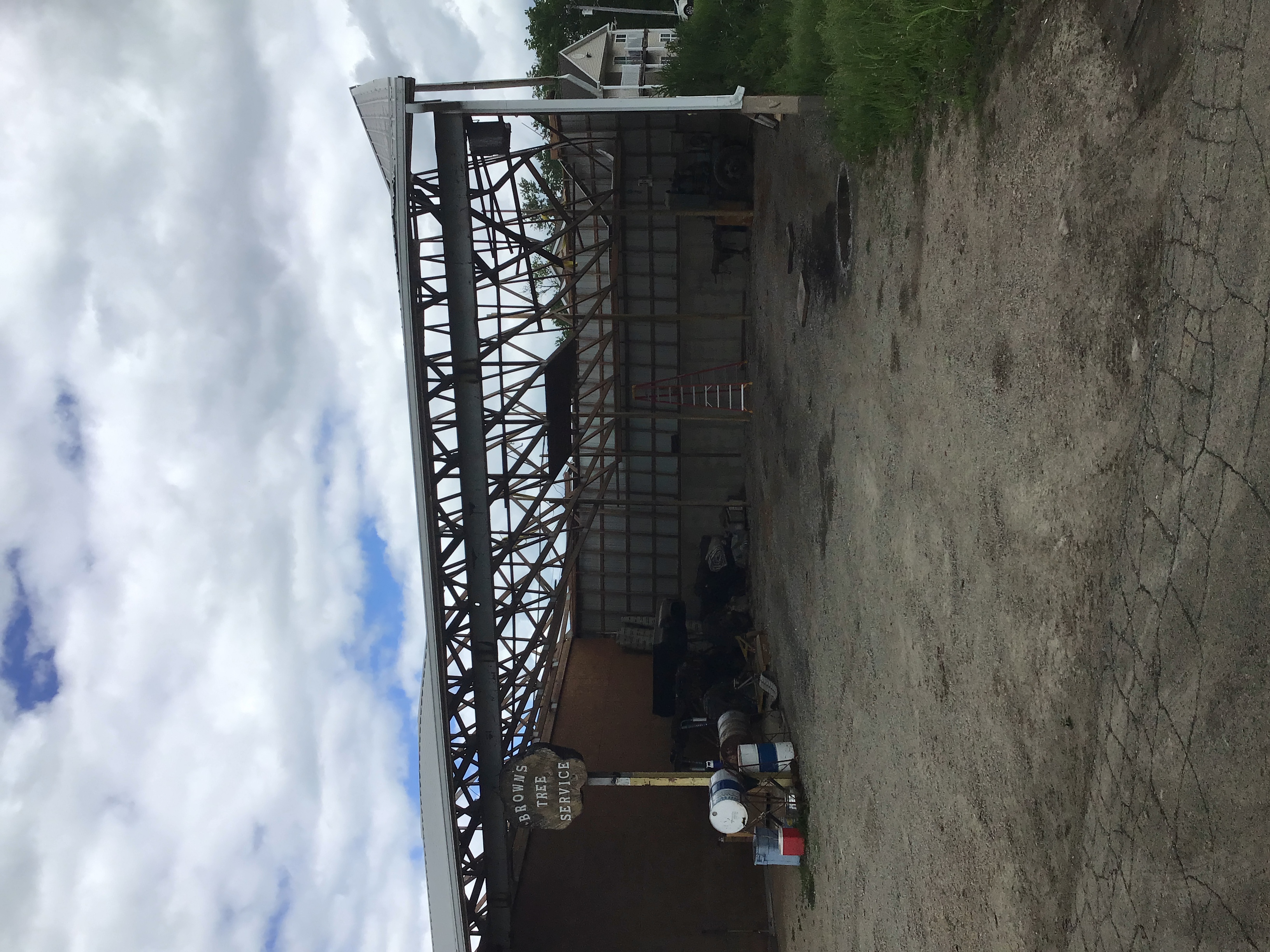 Machine shed with one open side missing roof